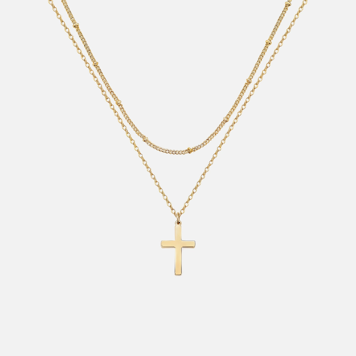 Layered Cross Necklace — studio shot