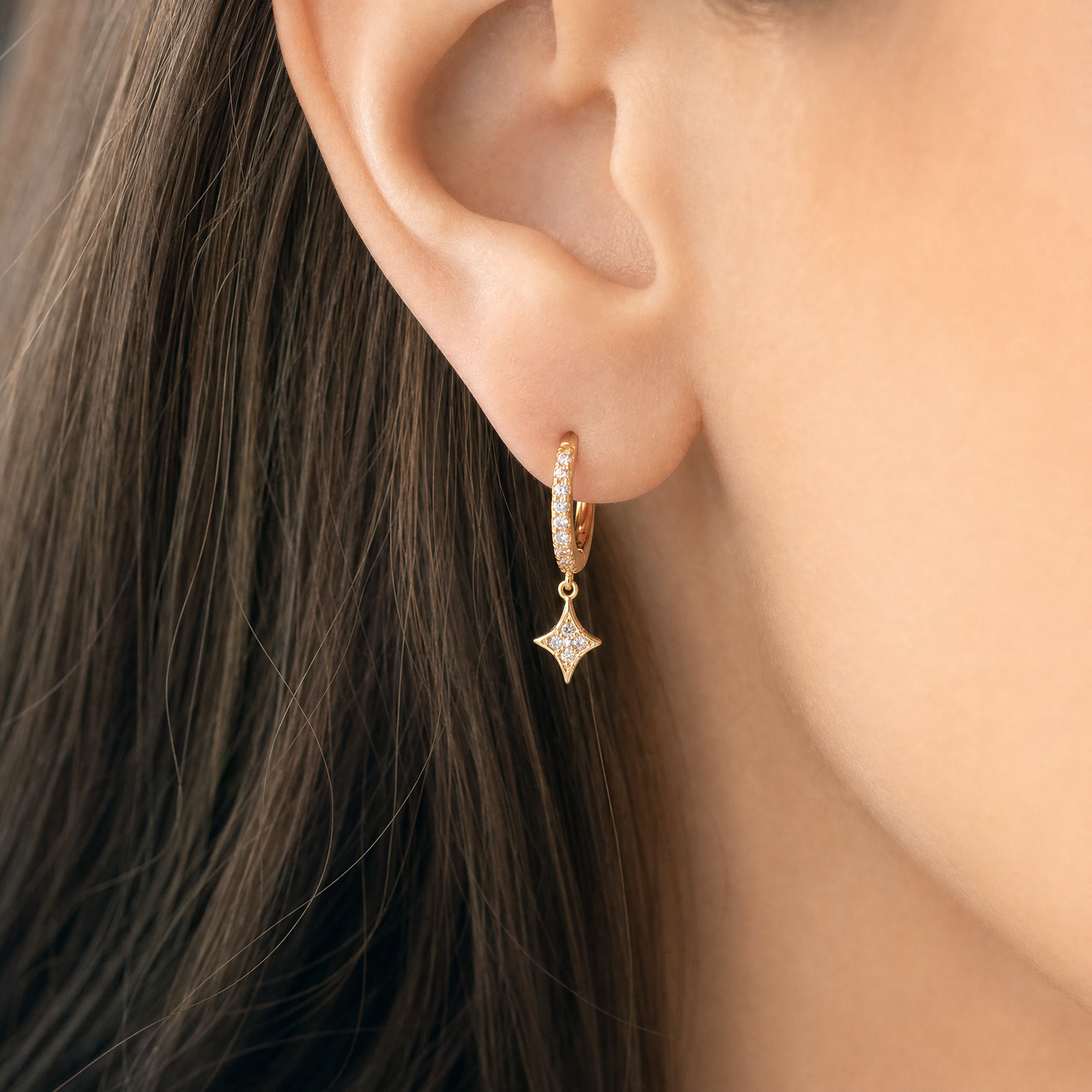 North Star Huggies — worn on ear