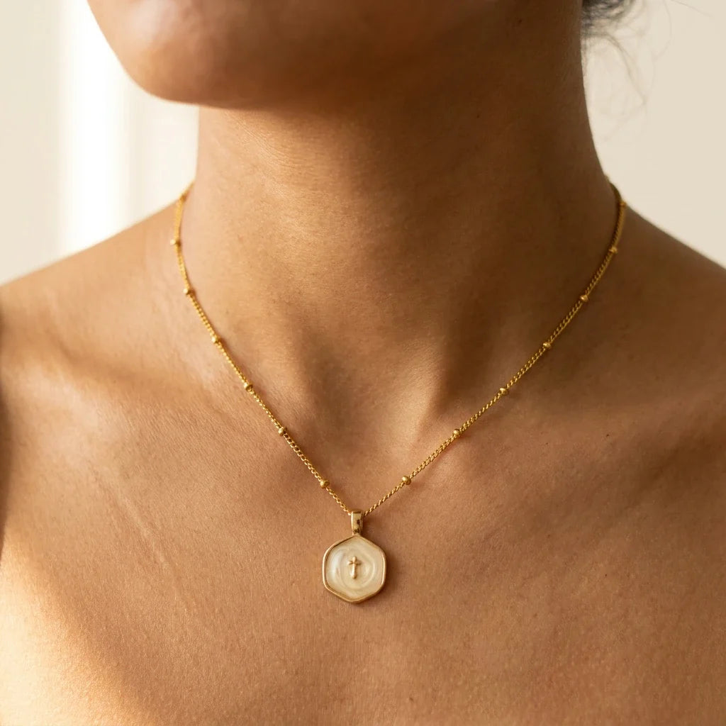 Sacred Flame Cross Necklace — worn