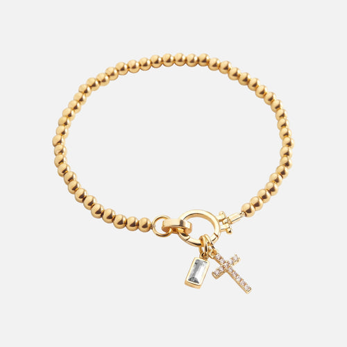 Baguette Birthstone Cross Bracelet — studio shot