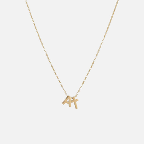 Initial Cross Necklace — studio shot