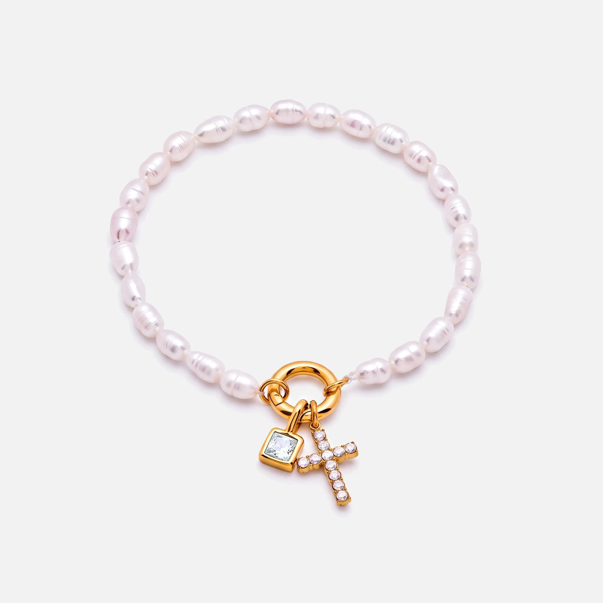 Pearl Birthstone Cross Bracelet — studio shot