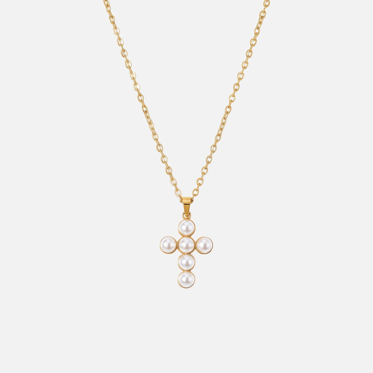 Pearl Cluster Cross Necklace — studio shot