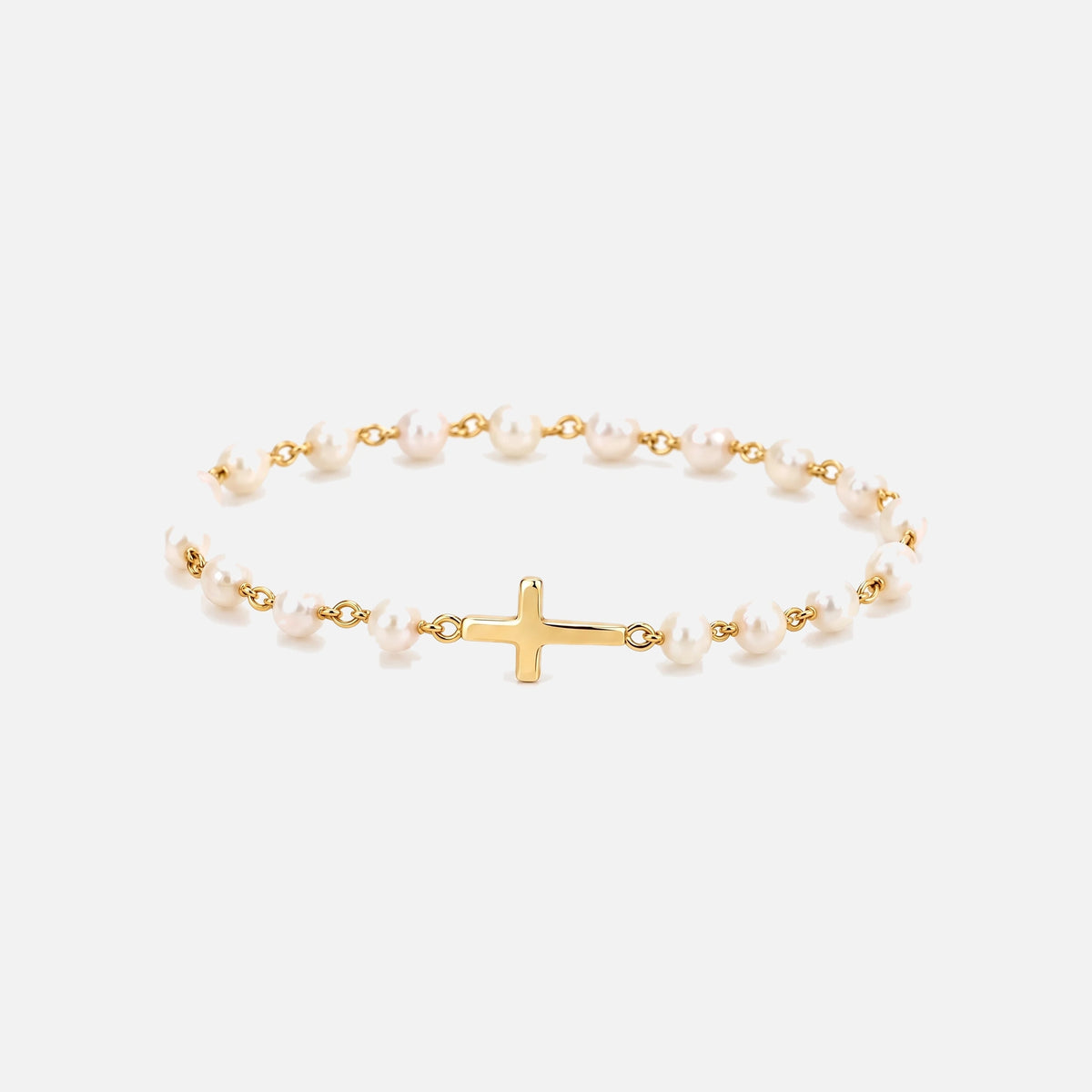 Pearl Cross Bracelet — studio shot