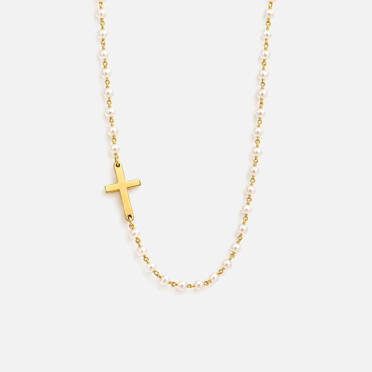 Pearl Cross Necklace — studio shot