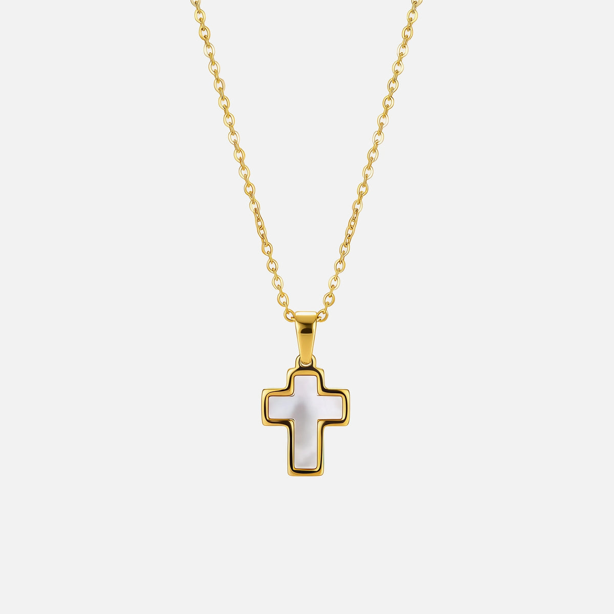 Shell Cross Necklace — studio shot