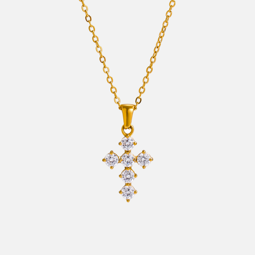 Petite Cross Necklace — studio shot on light grey