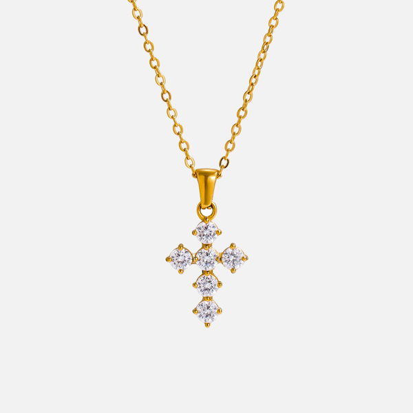 Petite Cross Necklace — studio shot on light grey