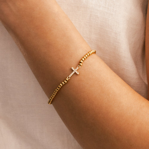 Beaded Stretch Cross Bracelet — worn