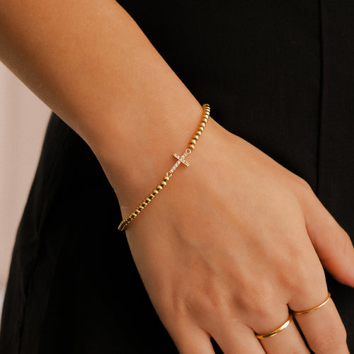 Beaded Stretch Cross Bracelet — worn
