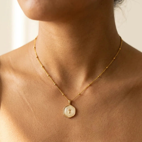 Sacred Flame Cross Necklace — worn